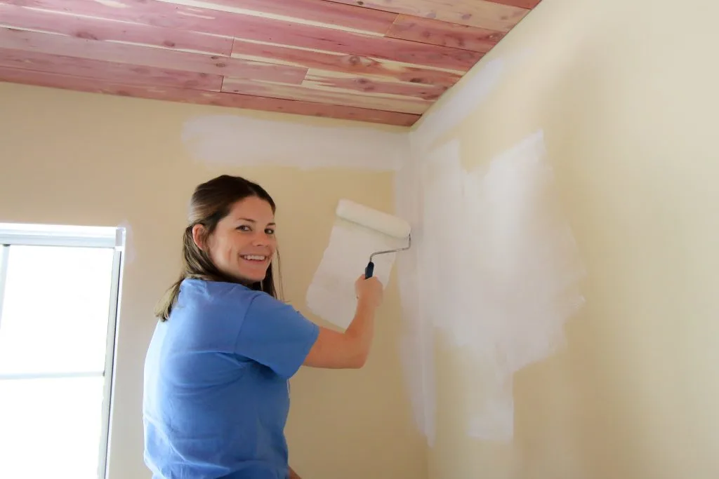 me painting a wall white