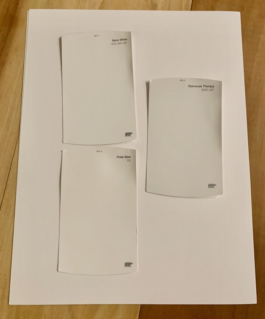 white swatches on a white sheet of paper