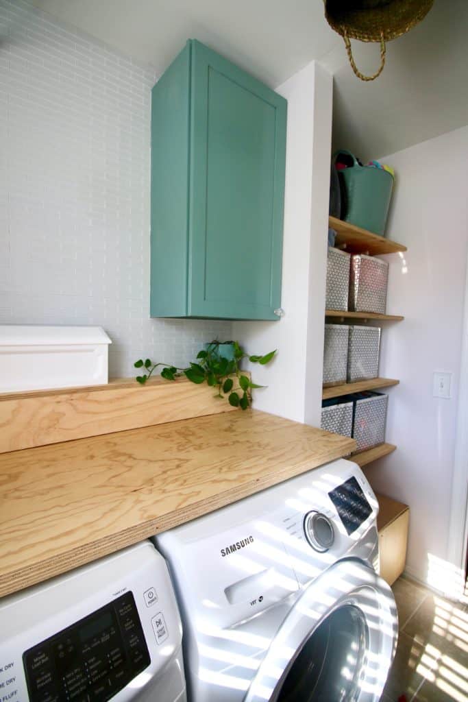 laundry room cabinet painted behr tower bridge
